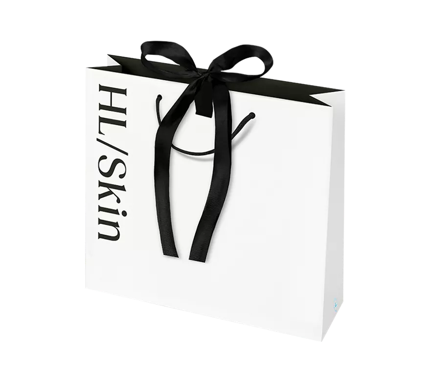 Bolsa de regalo grande HL/Skin blanca con cinta negra, elegante presentación para productos de belleza